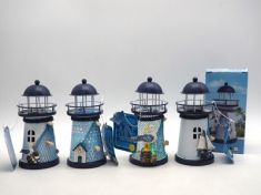 FARO IN METALLO PICCOLO CON LUCE A LED 17X6,5X6,5CM ASS