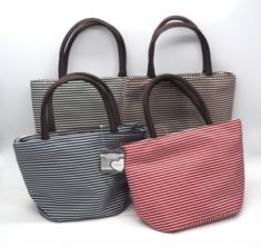 BORSETTA IN TESSUTO CON CERNIERA A RIGHE H.16/28 X22X14.5 CM