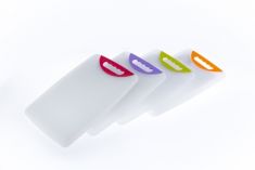 TAGLIERE IN PLASTICA CM. 36 CON MANICO COLORATO MODELLO TULIPANO.