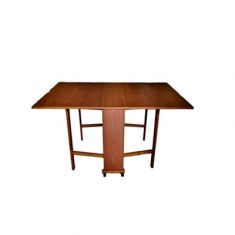 TAVOLO FORMICA GIORGIA NOCE 2 RUOTE 90X140 CM.