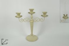 CANDELIERE IN FERRO ANTICHIZZATO