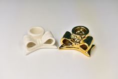 PORTACANDELA FIOCCO IN PORCELLANA 6X5X H. 3 CM.