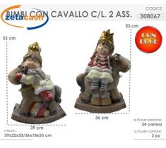 BAMBOLA NATALIZIA IN TERRACOTTA SU CAVALLUCCIO